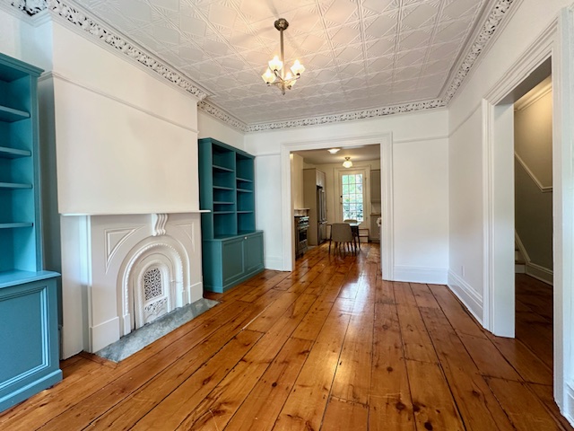 446 Sackett Street Brooklyn, NY 11231 - Photo 2 of 15 a view of a hallway with a chandelier