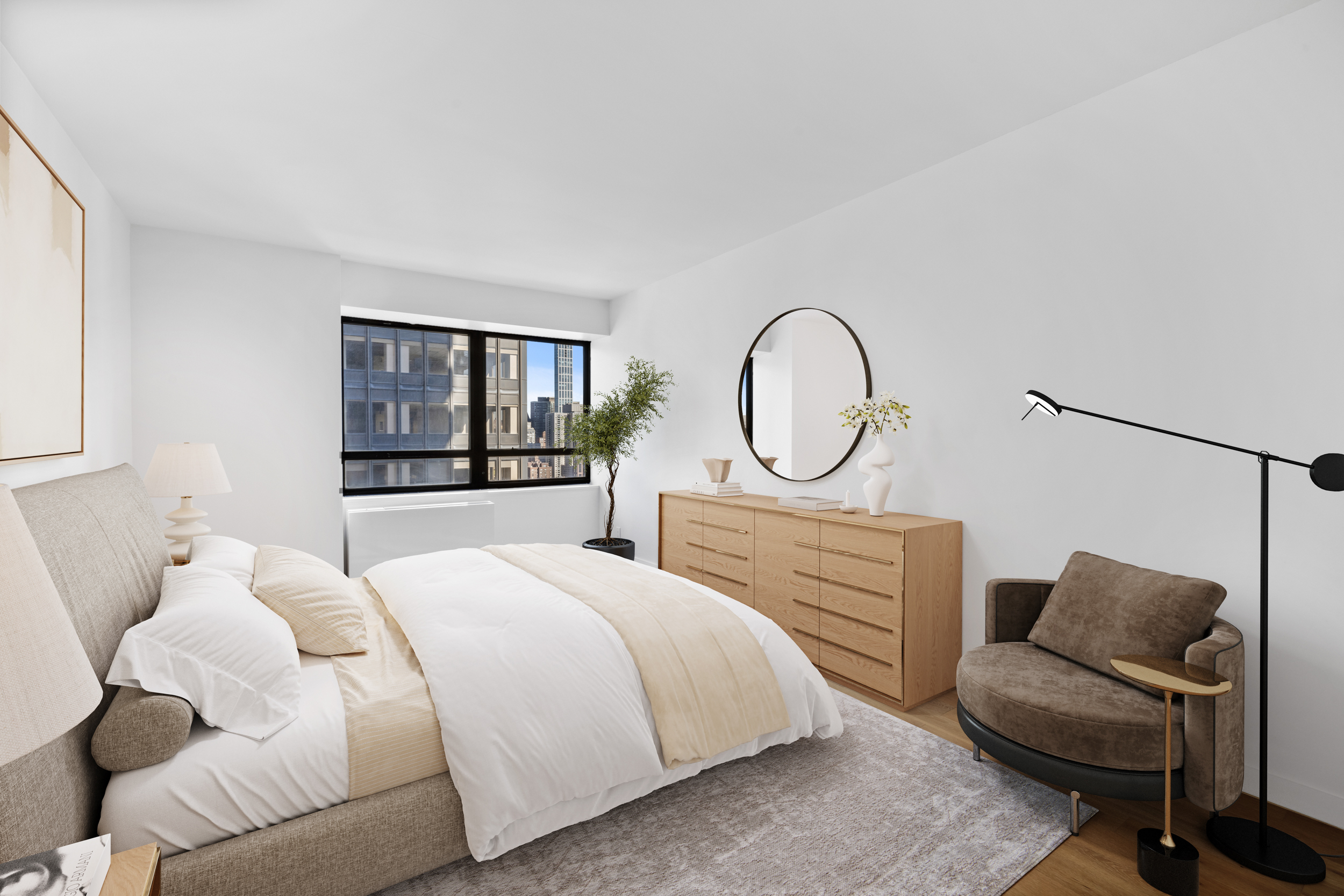 240 East 47th Street, Unit 27C Manhattan, NY 10017 - Photo 4 of 11 a bedroom with a bed a mirror and a large window