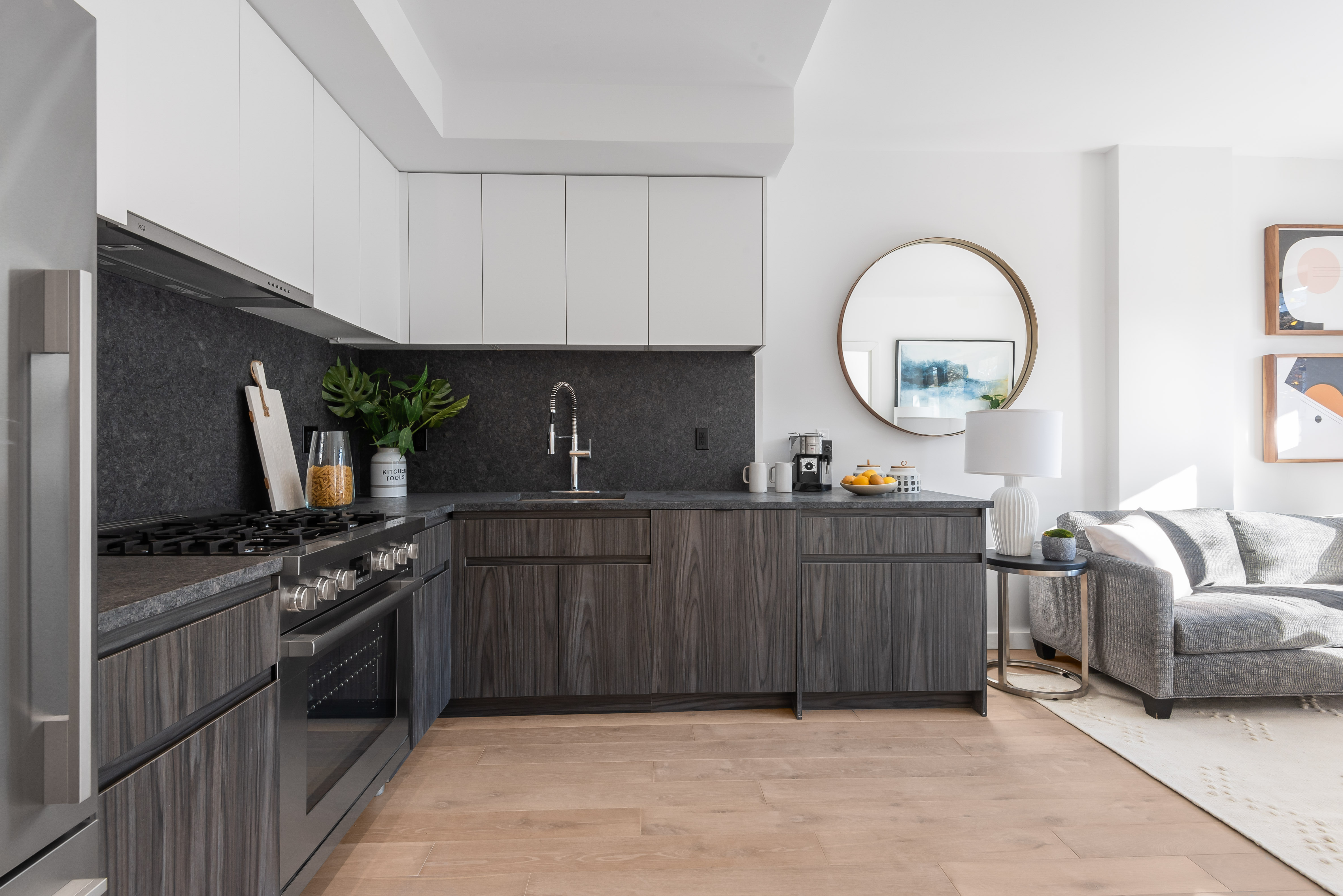 a kitchen with sink cabinets and stove
