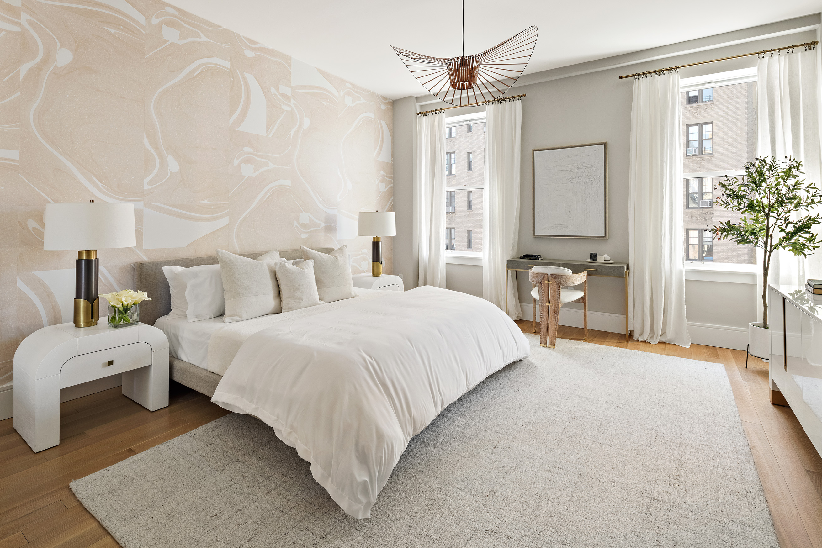 378 West End Avenue, Unit 7A Manhattan, NY 10024 - Photo 6 of 24 a spacious bedroom with a bed and a chandelier