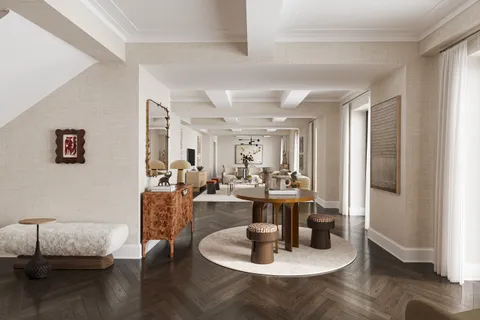 a living room with fireplace furniture and a wooden floor