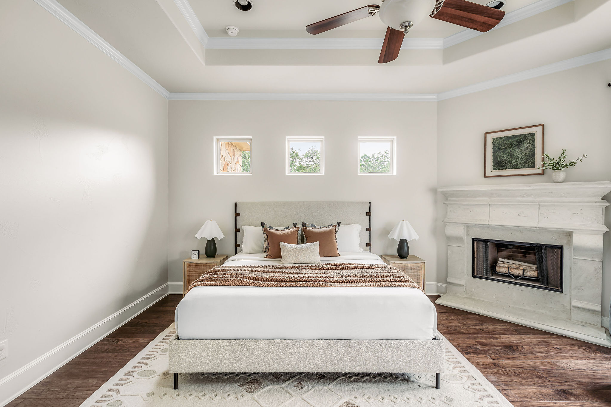 812 Jennings Branch Georgetown, TX 78633 - Photo 36 of 100 a spacious bedroom with a bed and a fireplace