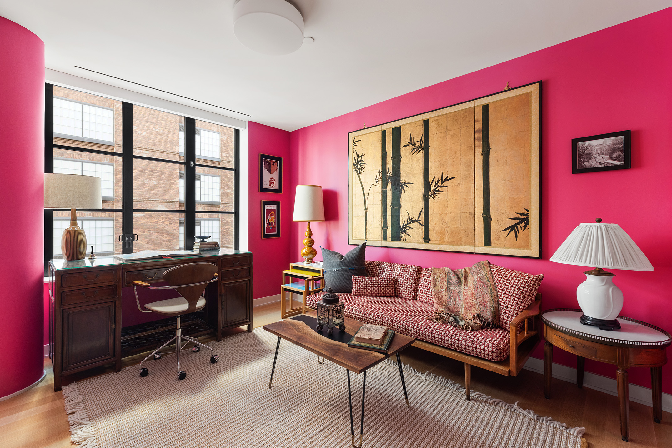 550 West 29th Street, Unit 5A Manhattan, NY 10001 - Photo 4 of 8 a living room with furniture and a large window