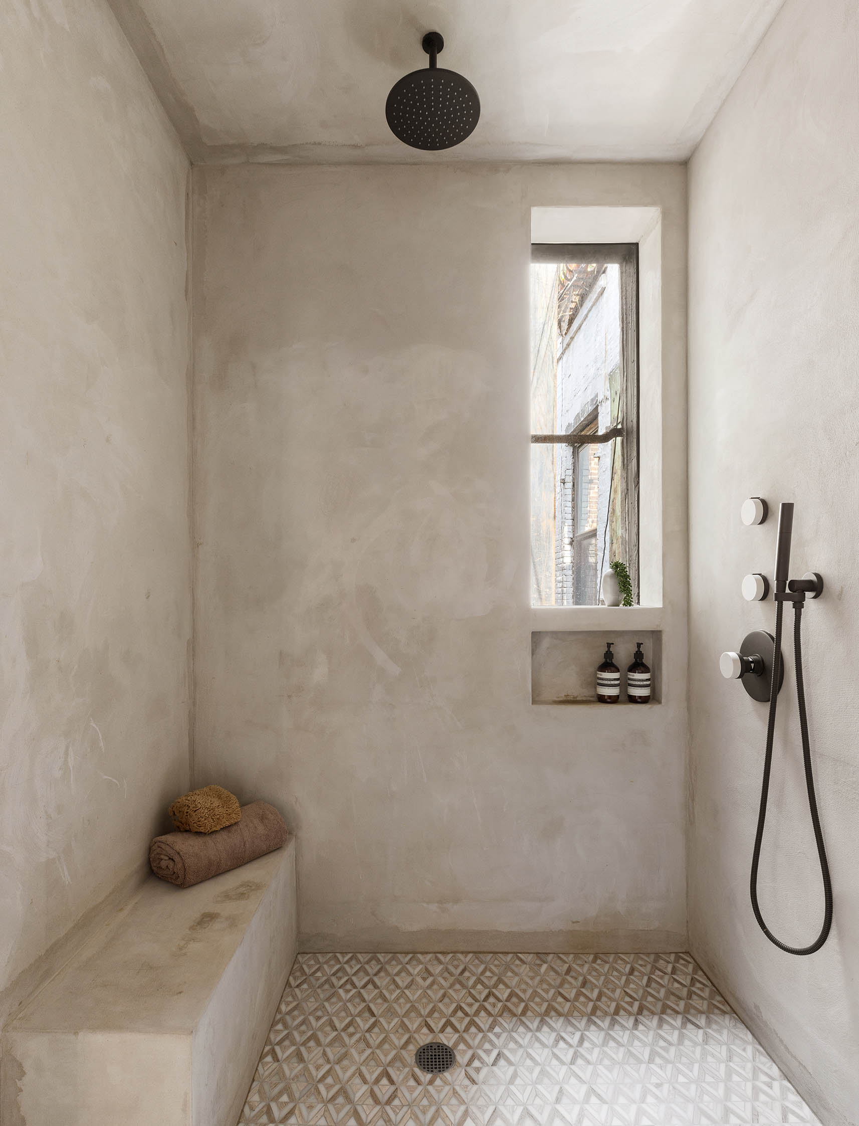 84 Forsyth Street, Unit 5R Manhattan, NY 10002 - Photo 12 of 14 a bathroom with a shower