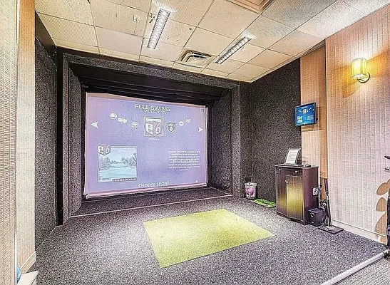 330 East 38th Street, Unit 20E Manhattan, NY 10016 - Photo 16 of 17 a view of an empty room with a fireplace and a window