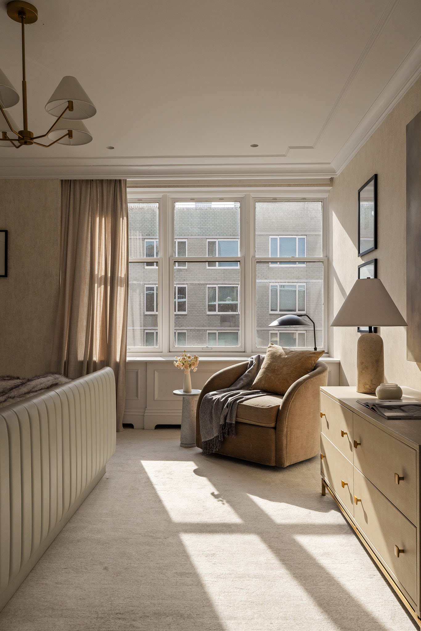 350 East 57th Street, Unit 15B Manhattan, NY 10022 - Photo 17 of 20 a bedroom with furniture and a window