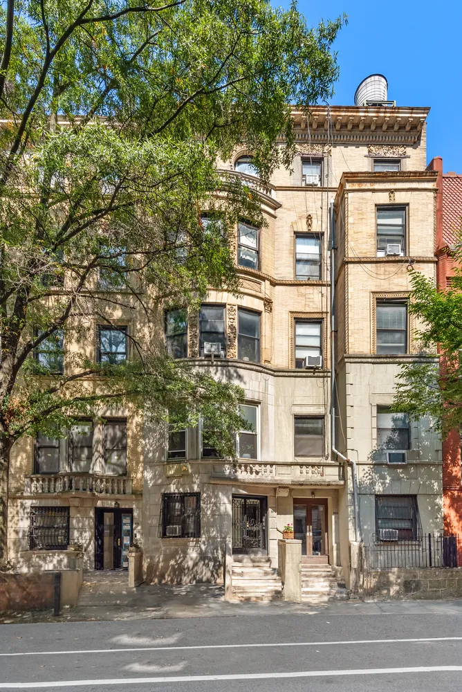 a view of a building with a street