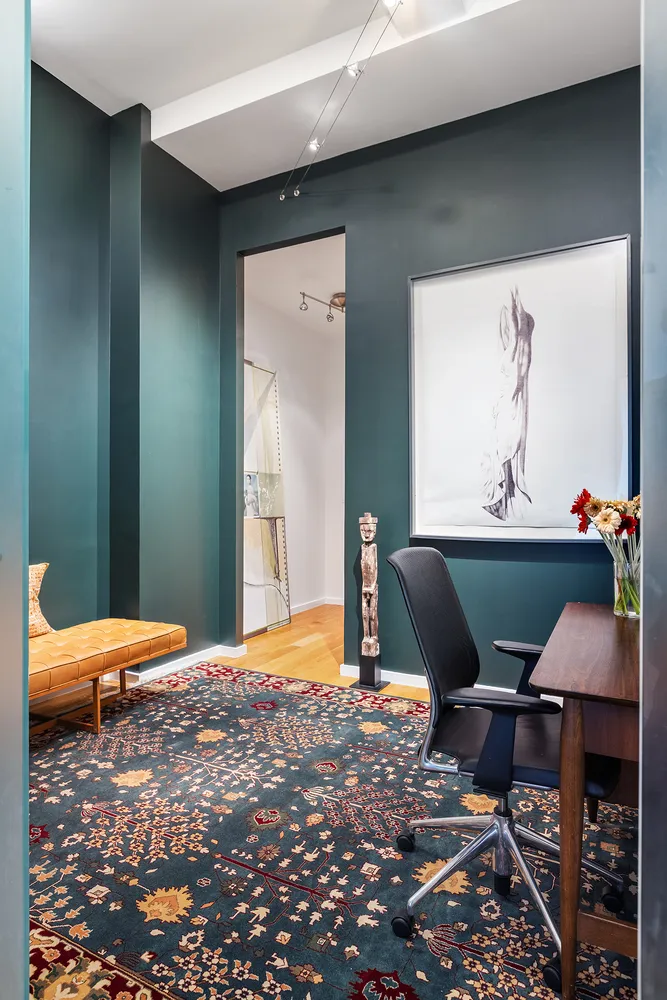 a room with a bed and a table