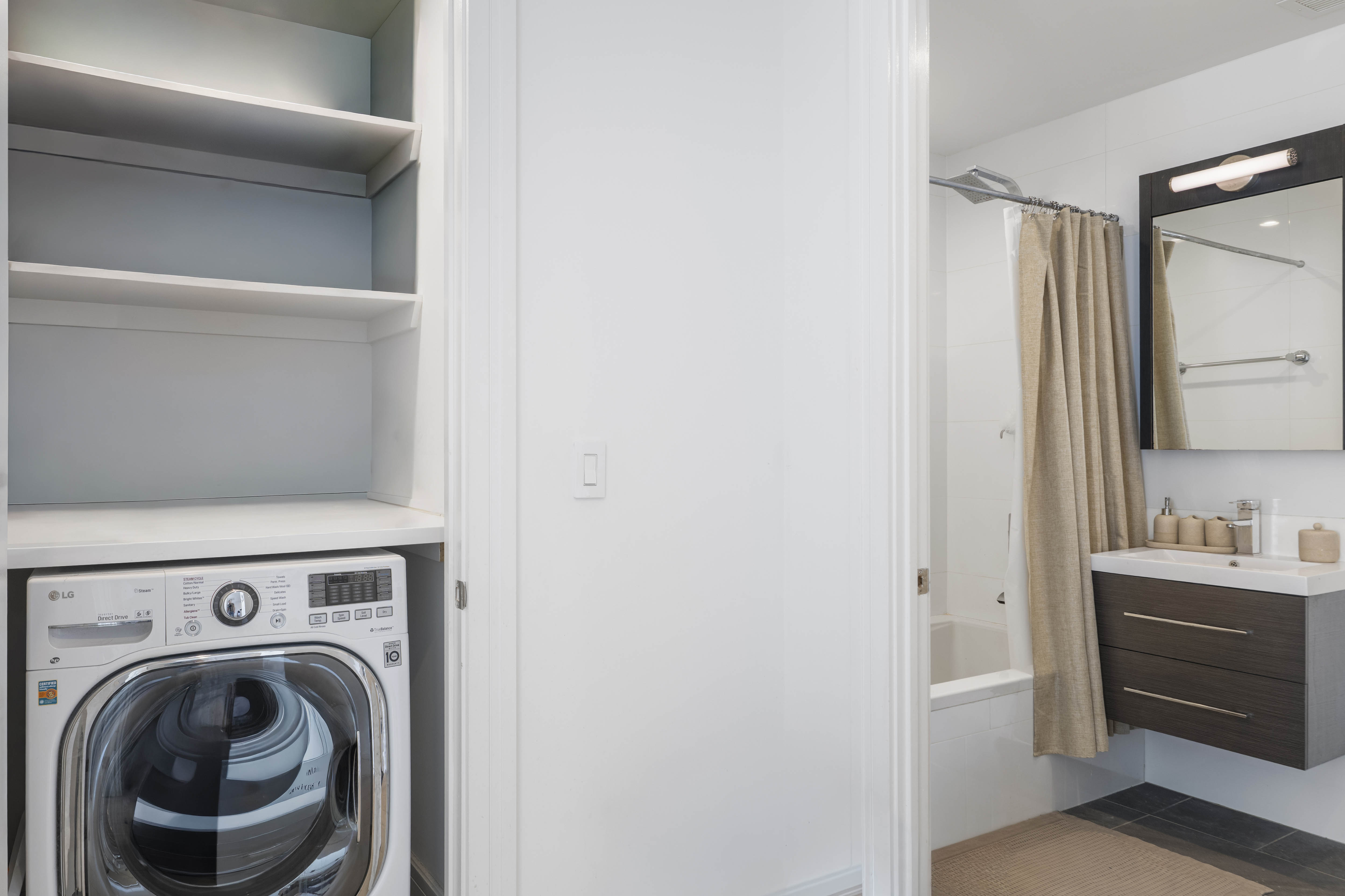 695 6th Avenue, Unit 2P Brooklyn, NY 11215 - Photo 9 of 15 a utility room with dryer and washer