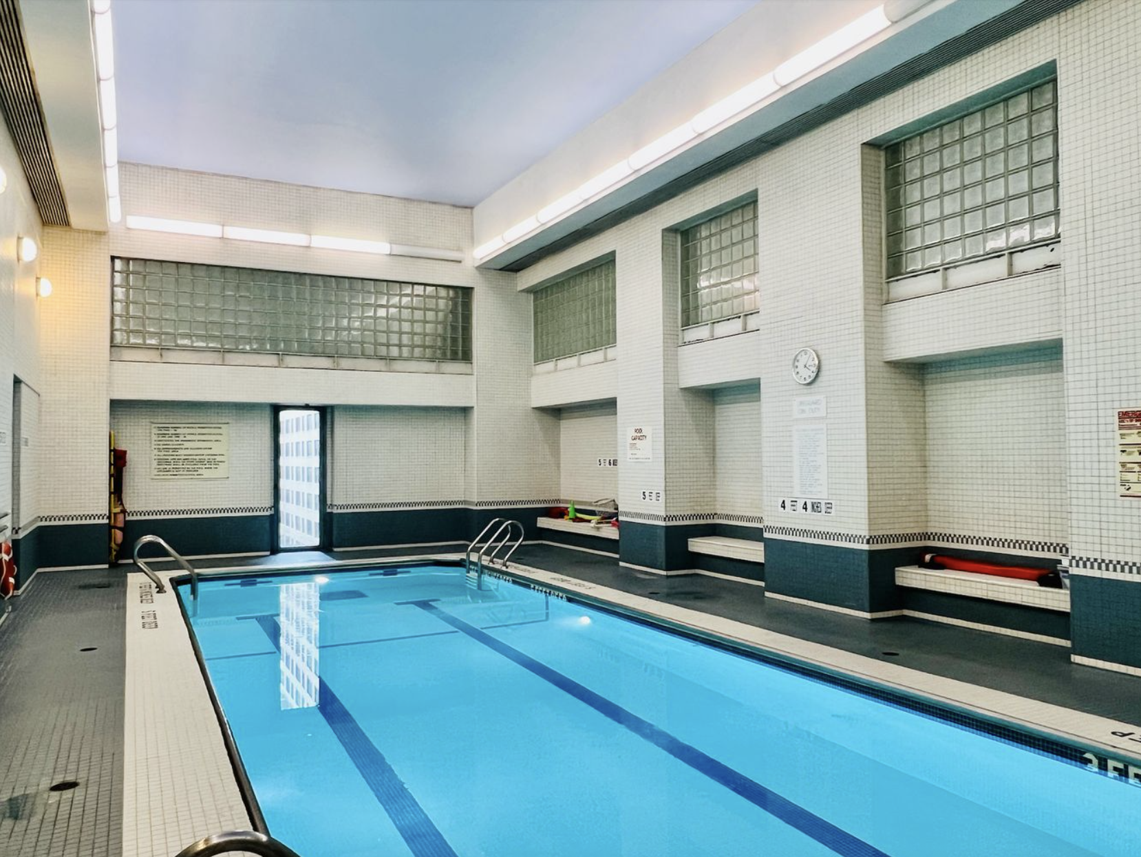 301 West 57th Street, Unit 3E Manhattan, NY 10019 - Photo 11 of 13 a view of kitchen with windows