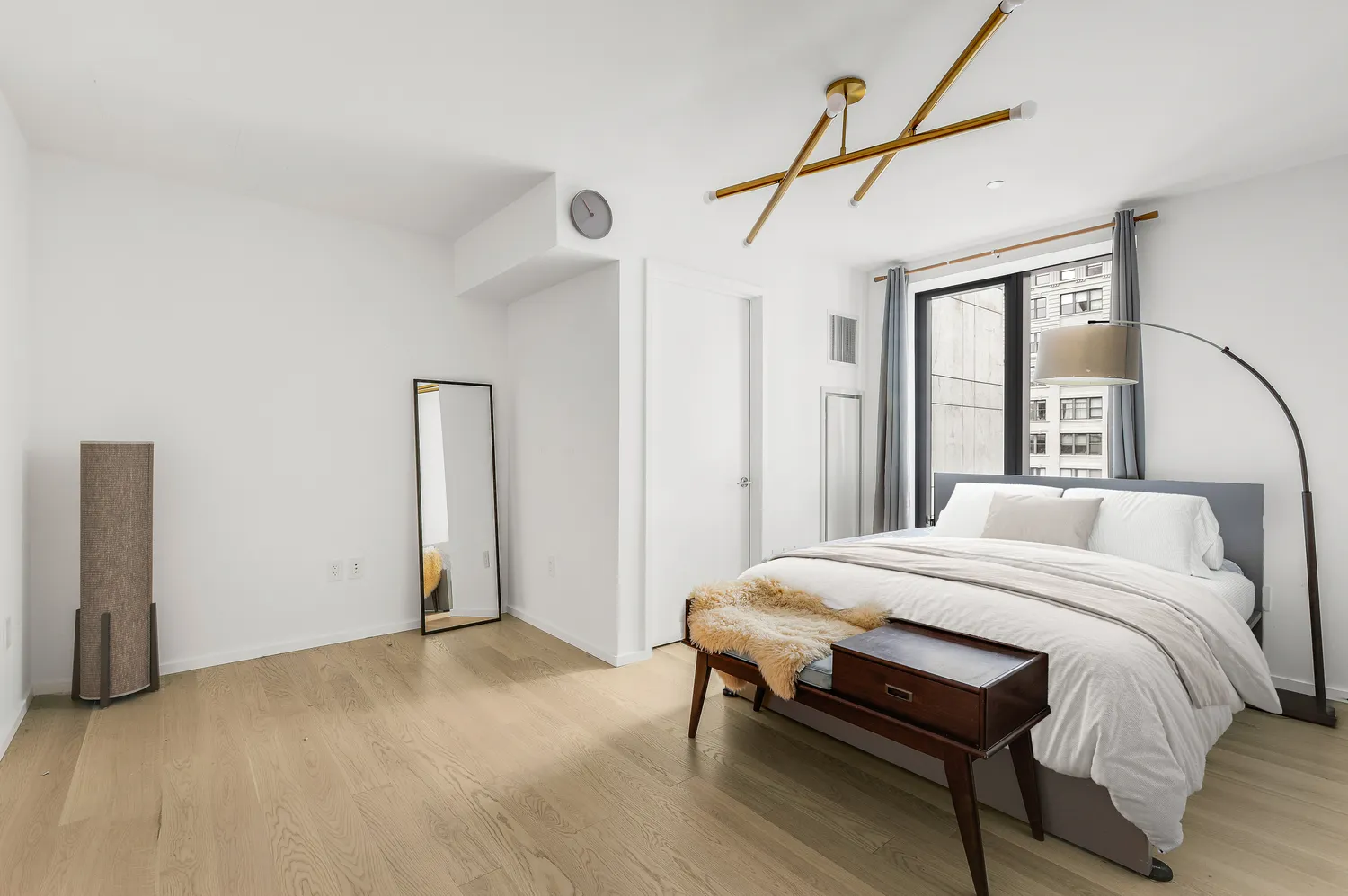 a bedroom with a bed and a table