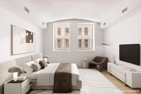 a bathroom with a granite countertop sink mirror and a bathtub