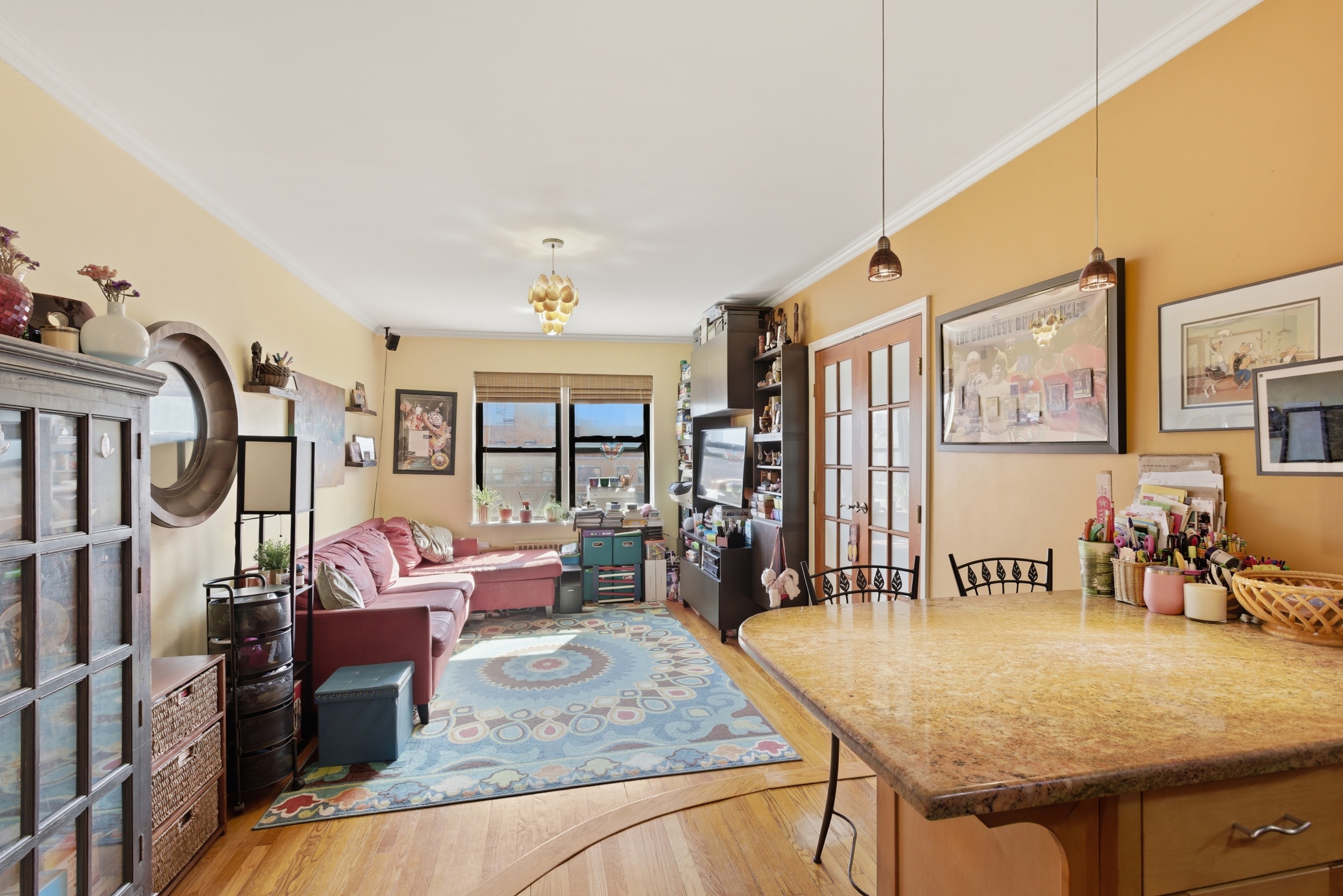 a living room with furniture and a table
