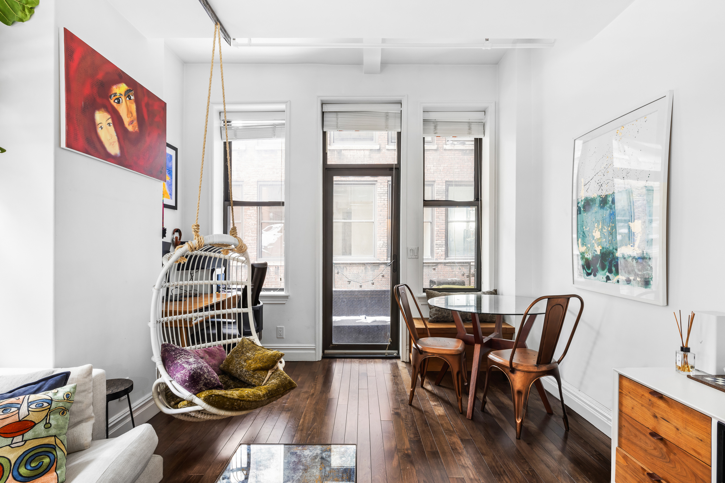 43-45 East 30th Street, Unit 5C Manhattan, NY 10016 - Photo 3 of 8 a workspace with furniture and window