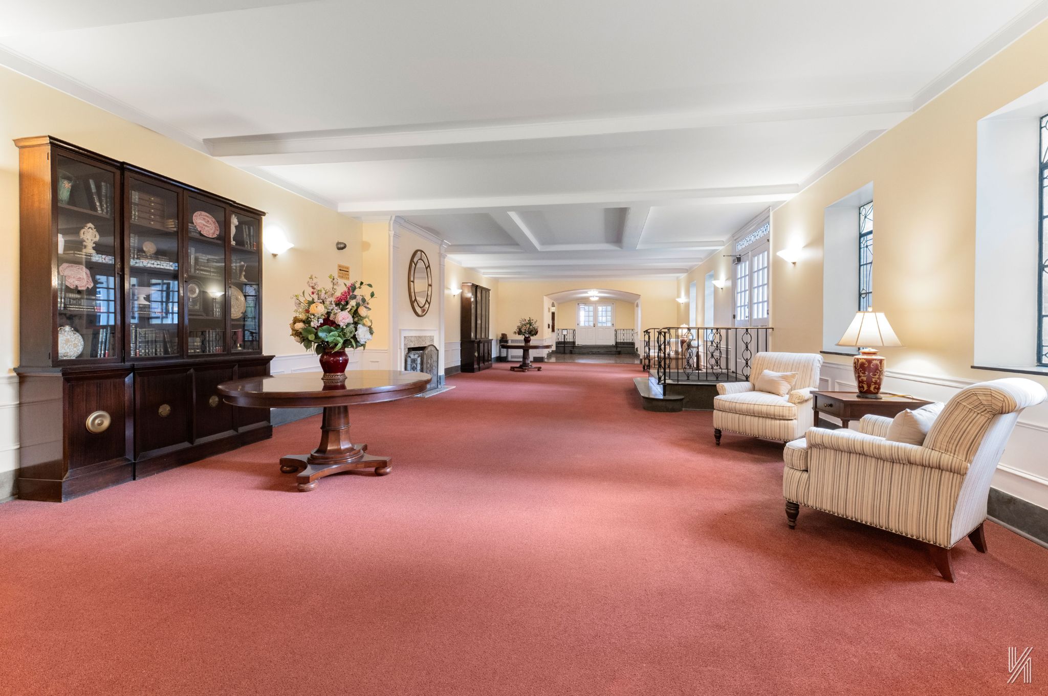 25-40 31st Avenue, Unit 6F Queens, NY 11106 - Photo 17 of 19 a living room with furniture a flat screen tv and a large window