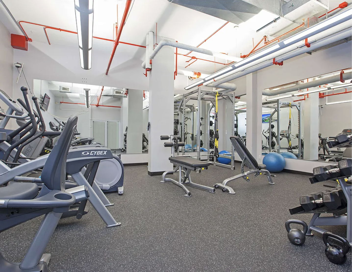 150 East 85th Street, Unit 3F Manhattan, NY 10028 - Photo 13 of 15 a view of a room with gym equipment