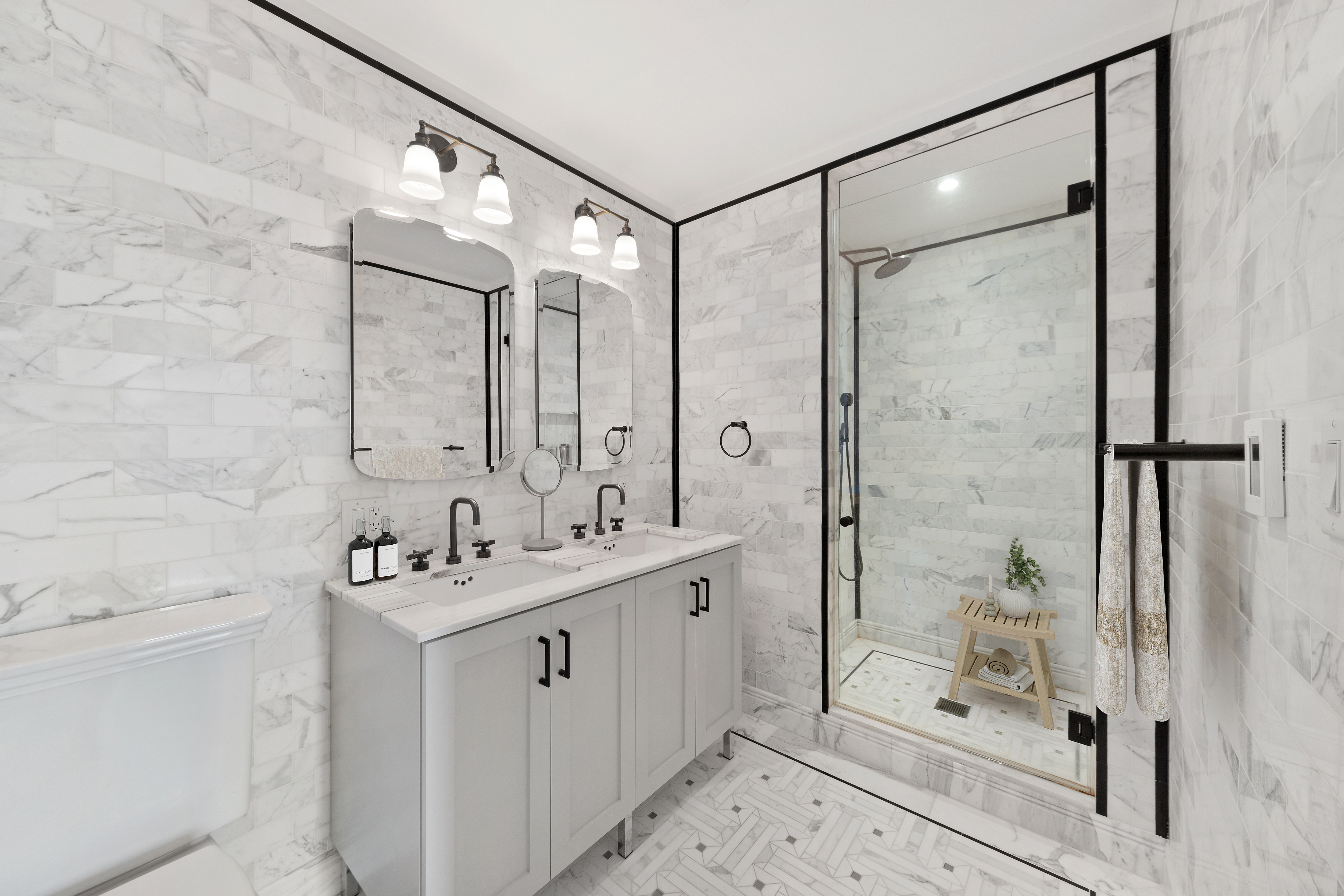265 State Street, Unit 1008 Brooklyn, NY 11201 - Photo 8 of 19 a bathroom with a shower sink and mirror