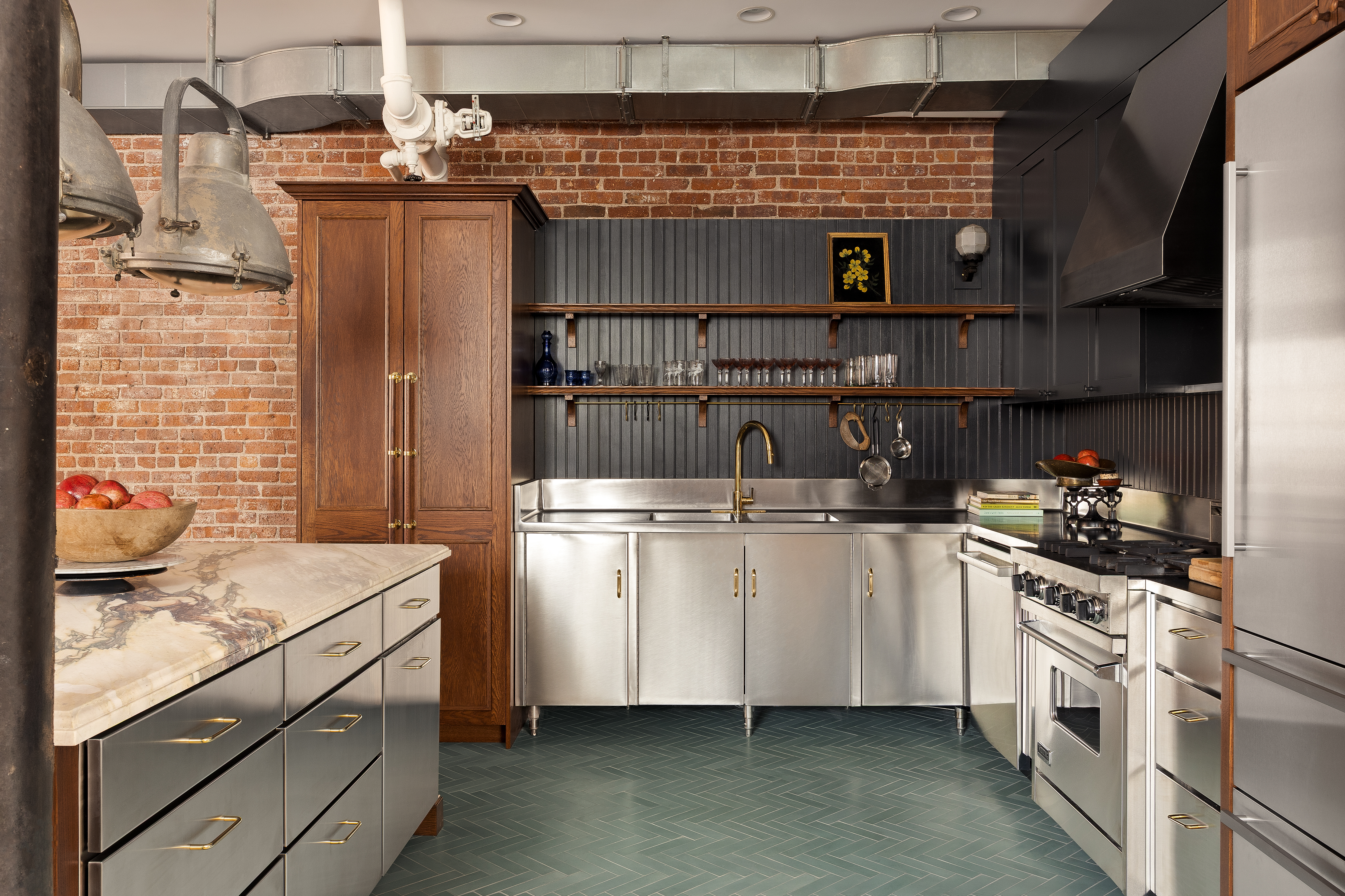 182 Lafayette Street, Unit 5 Manhattan, NY 10013 - Photo 7 of 19 a kitchen with a stove and a refrigerator