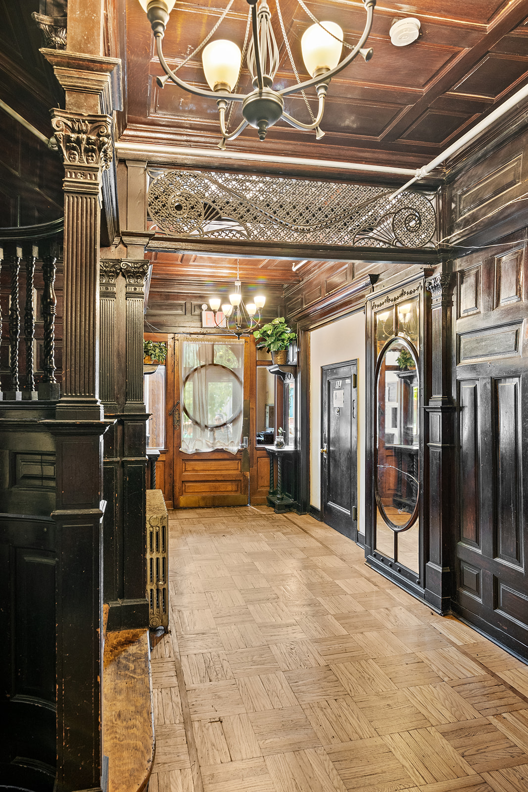 237 Hancock Street, Unit 13 Brooklyn, NY 11216 - Photo 5 of 7 a view of a hallway with wooden floor