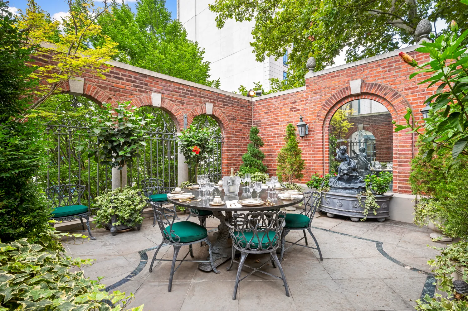 a bedroom with a bed a mirror on dresser and a window