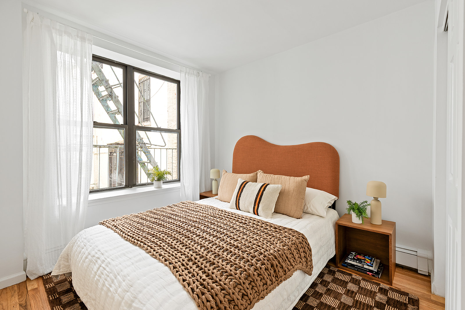 147 South Oxford Street, Unit 2C Brooklyn, NY 11217 - Photo 4 of 12 a bedroom with a bed and a window