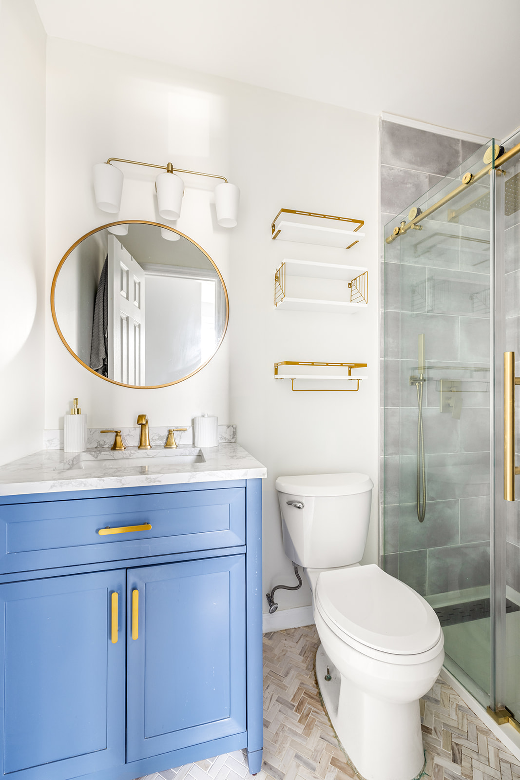 466 81st Street Brooklyn, NY 11209 - Photo 7 of 15 a bathroom with a toilet a sink and mirror
