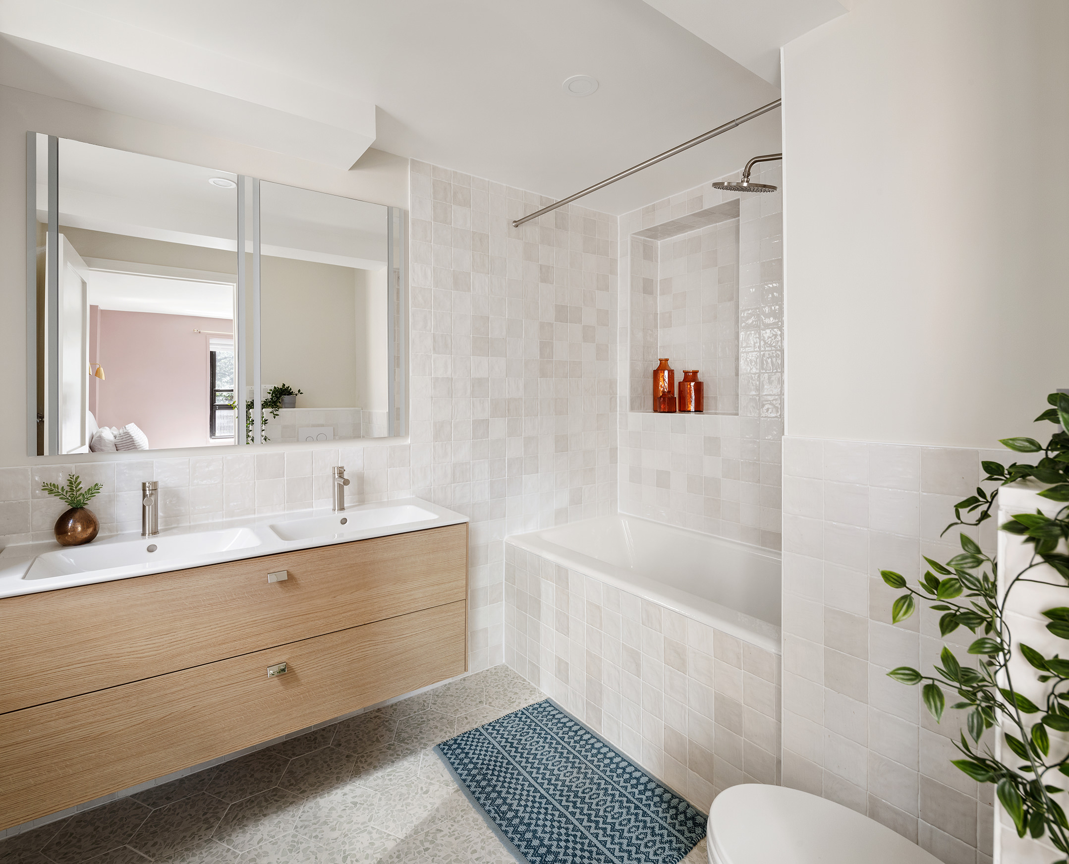 209 Clinton Avenue, Unit 2BC Brooklyn, NY 11205 - Photo 6 of 13 a bathroom with a sink toilet and shower