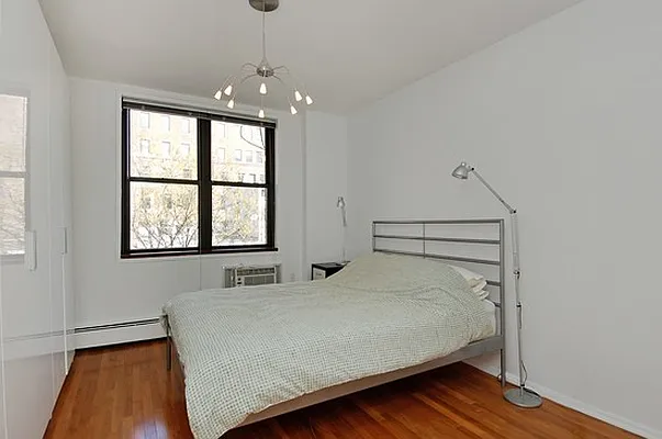 229 East 29th Street, Unit 5N Manhattan, NY 10016 - Photo 3 of 5 a bedroom with a bed and window