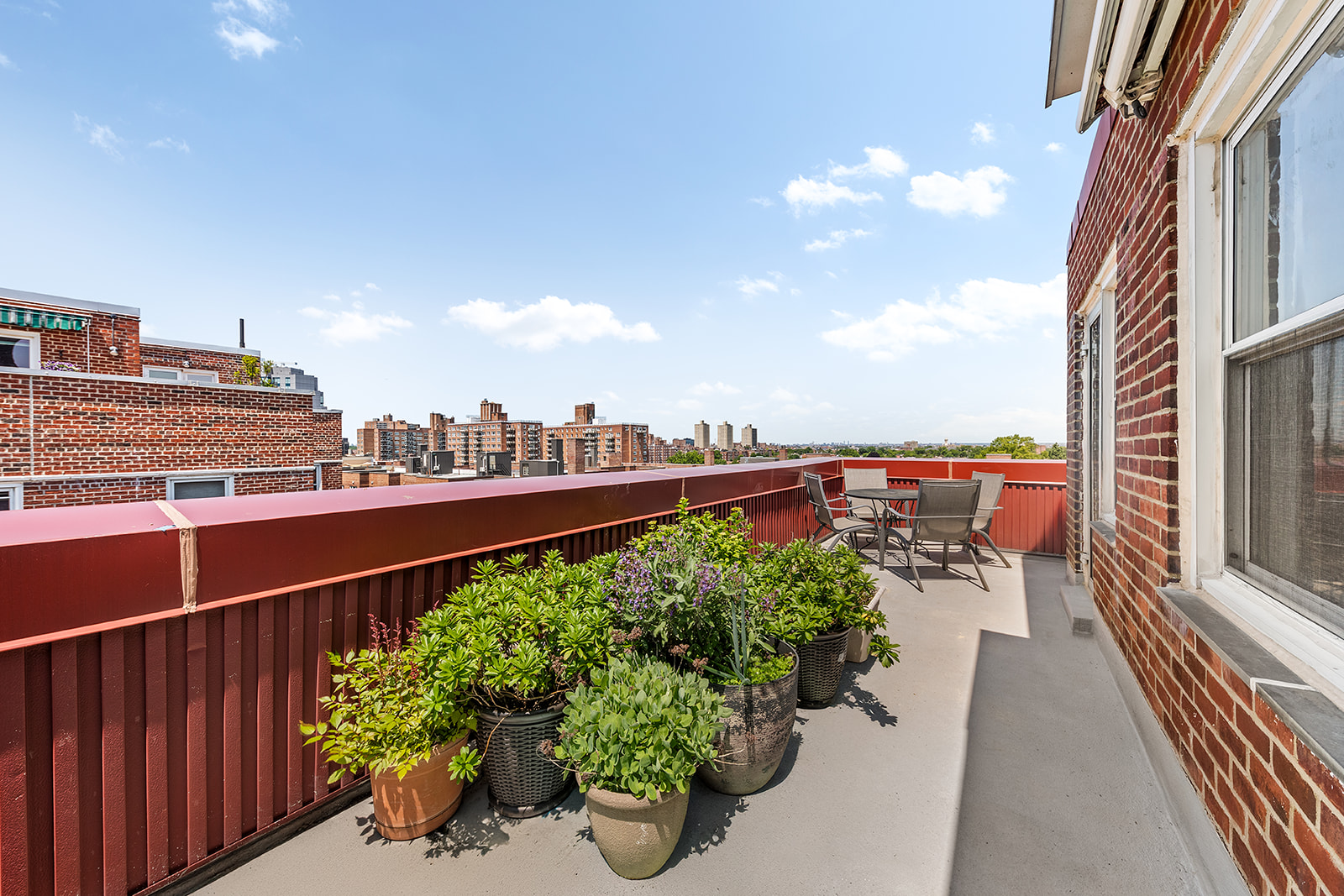 110-50 71st Road, Unit PHD Queens, NY 11375 - Photo 5 of 14 a view of a balcony with city view
