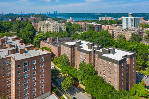 a view of a city with tall buildings