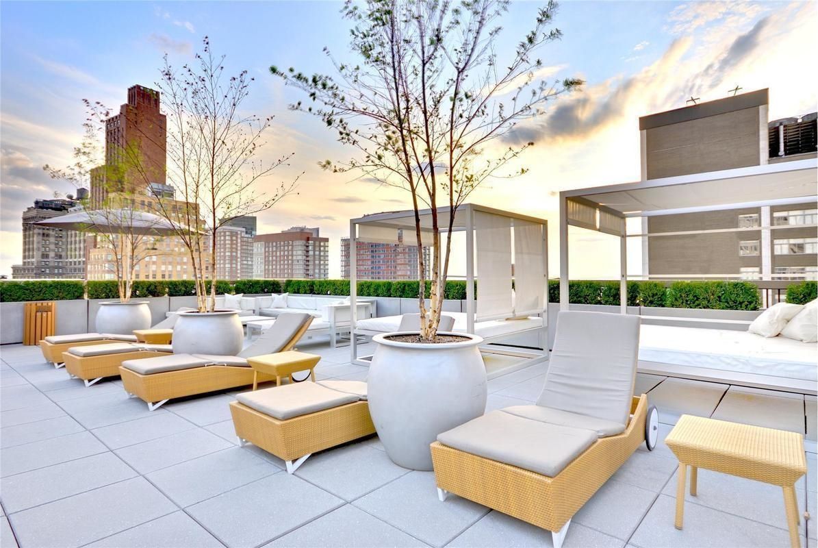 88 Greenwich Street, Unit 1218 Manhattan, NY 10006 - Photo 24 of 30 a view of pool with seating area and barbeque oven