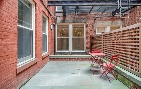 a front view of a building with glass windows