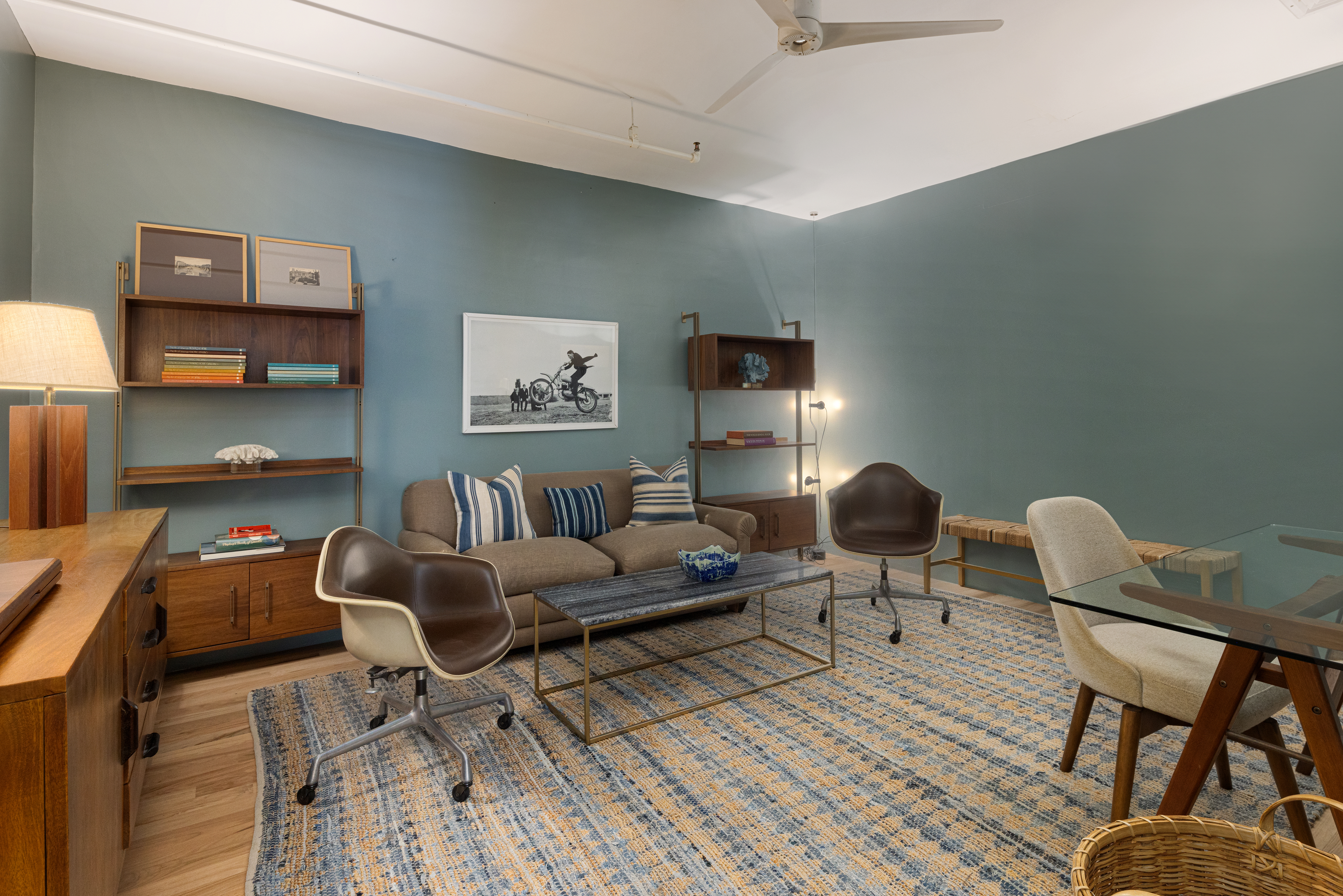 191 Chrystie Street, Unit 5R Manhattan, NY 10002 - Photo 12 of 16 a living room with furniture and a lamp