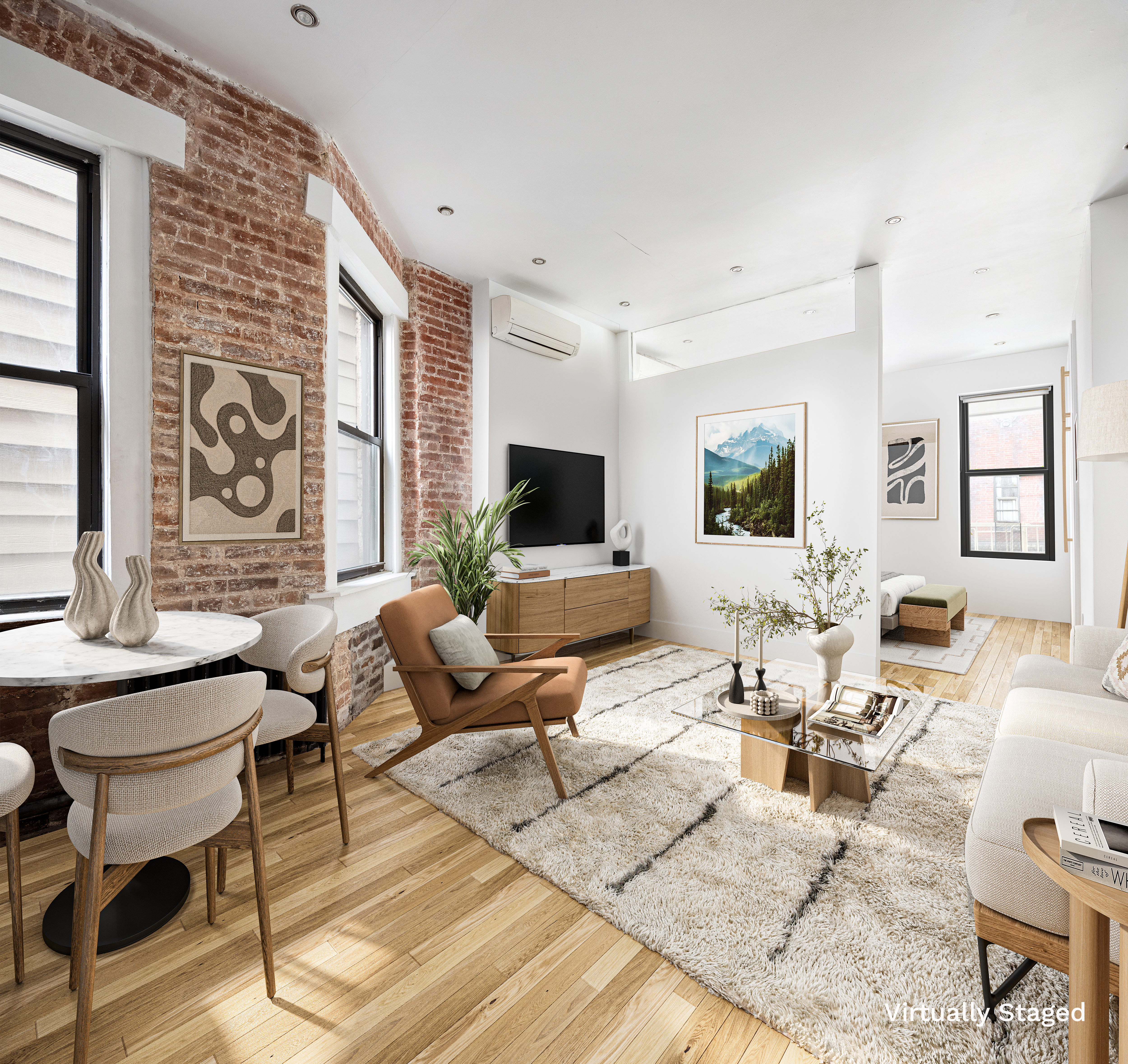 32 Jones Street, Unit 2A Manhattan, NY 10014 - Photo 2 of 7 a living room with furniture and a flat screen tv