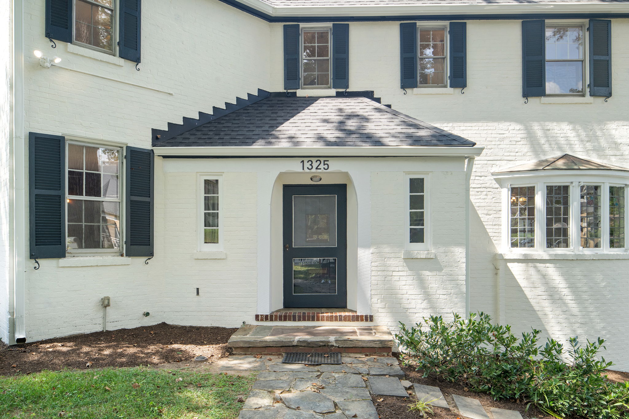 1325 Locust Road Northwest Washington, DC 20012 - Photo 4 of 56 a front view of a house