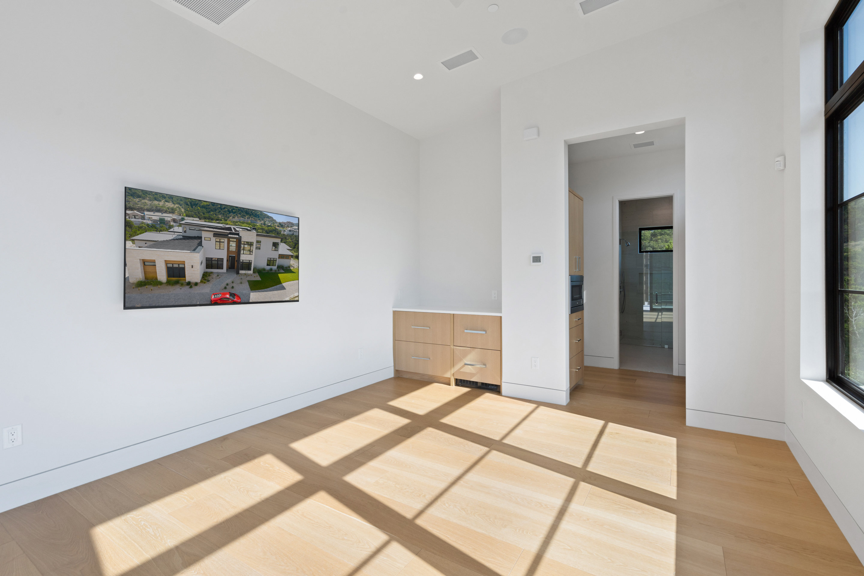 1905 Hallam Drive Austin, TX 78746 - Photo 25 of 39 a view of a room with a large window