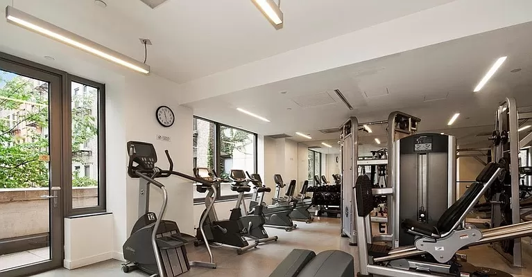 450 East 83rd Street, Unit 3A Manhattan, NY 10028 - Photo 7 of 9 a view of a room with gym equipment