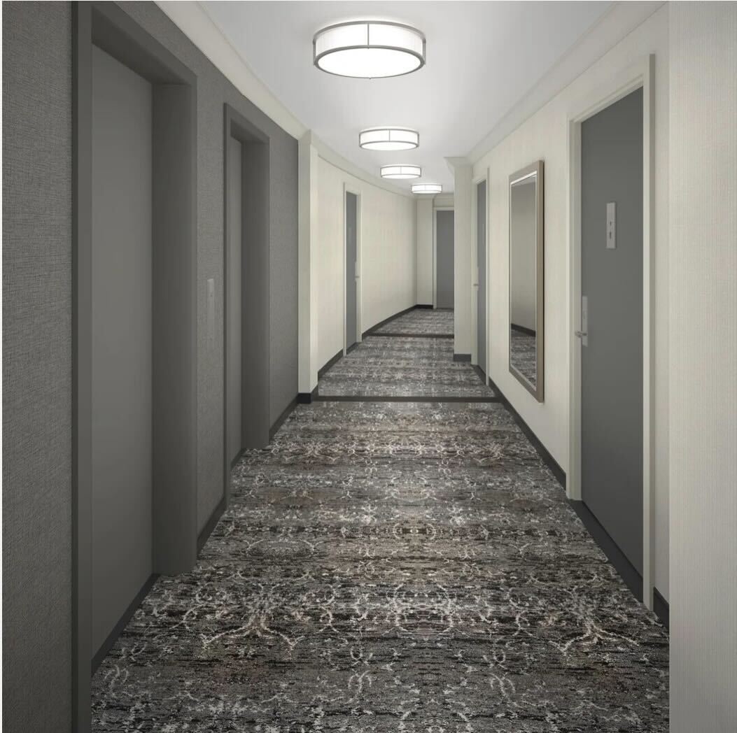 225 East 36th Street, Unit 10N Manhattan, NY 10016 - Photo 10 of 13 a view of hallway with wooden floor