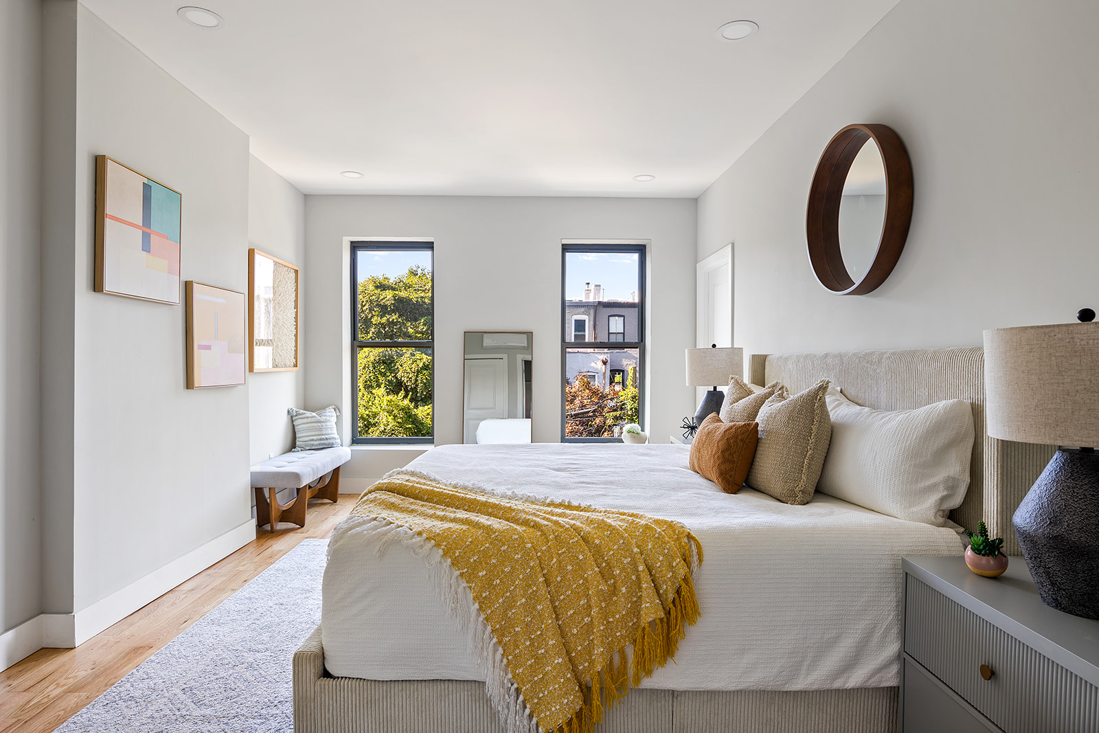 497 Madison Street Brooklyn, NY 11221 - Photo 9 of 19 a bedroom with a bed and a large window