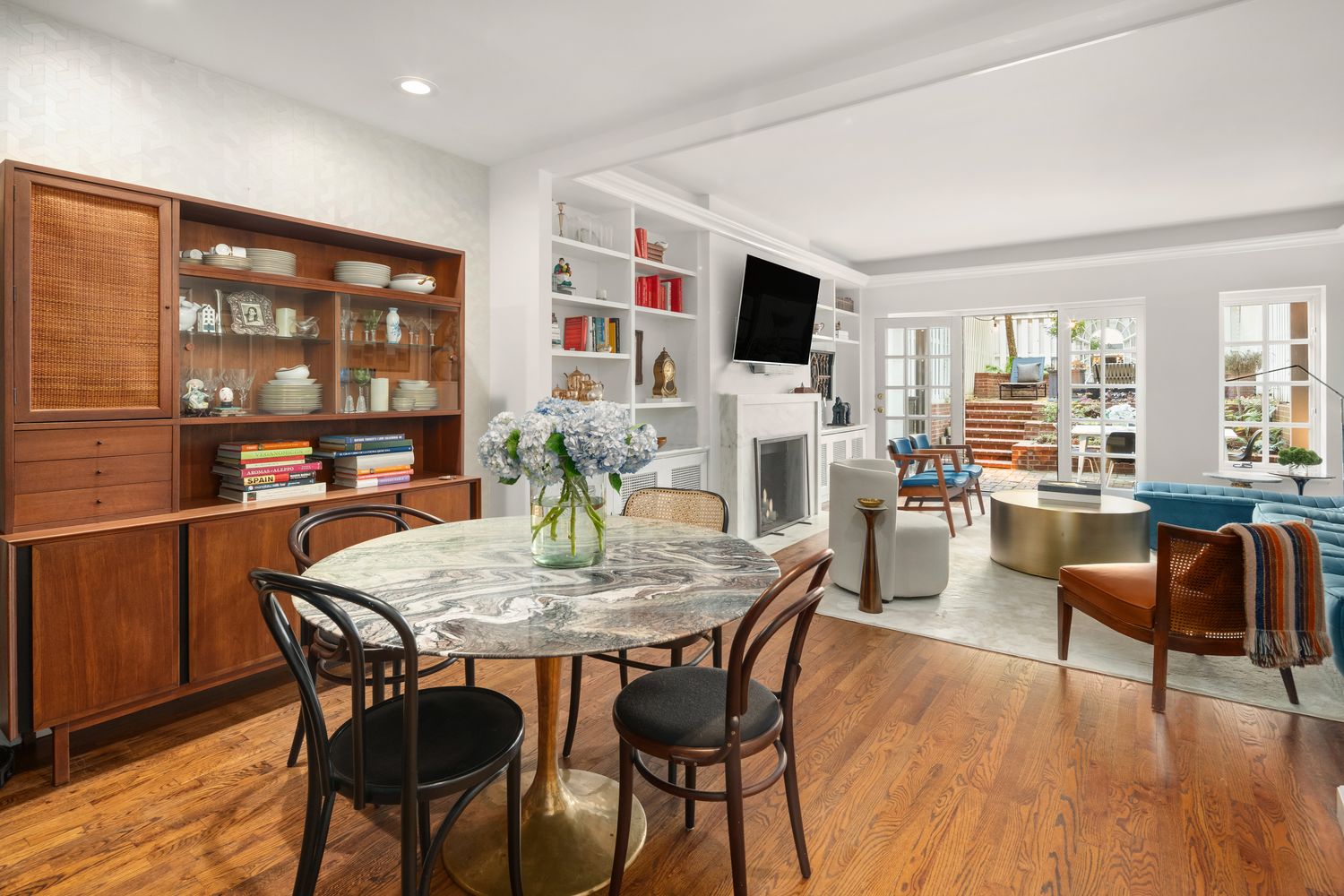 a view of a dining room with furniture window and outside view