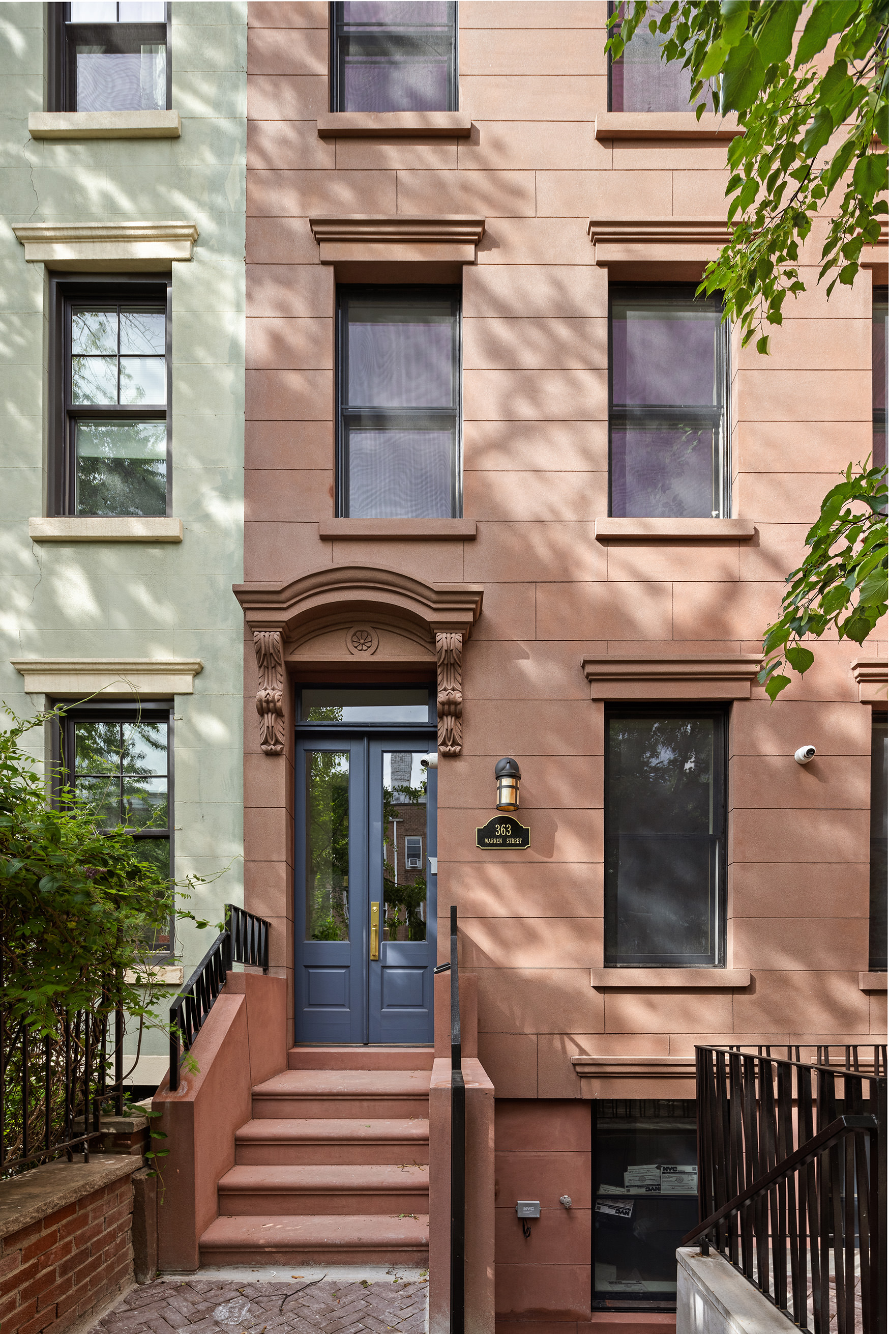 363 Warren Street Brooklyn, NY 11201 - Photo 20 of 23 a front view of a house with a porch