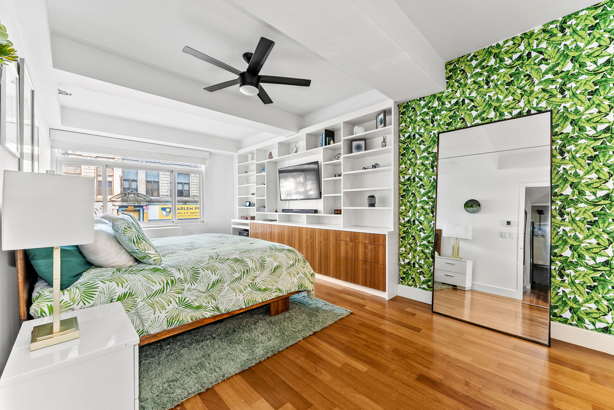106 West 116th Street, Unit 2A Manhattan, NY 10026 - Photo 6 of 16 a living room with furniture and a wooden floor