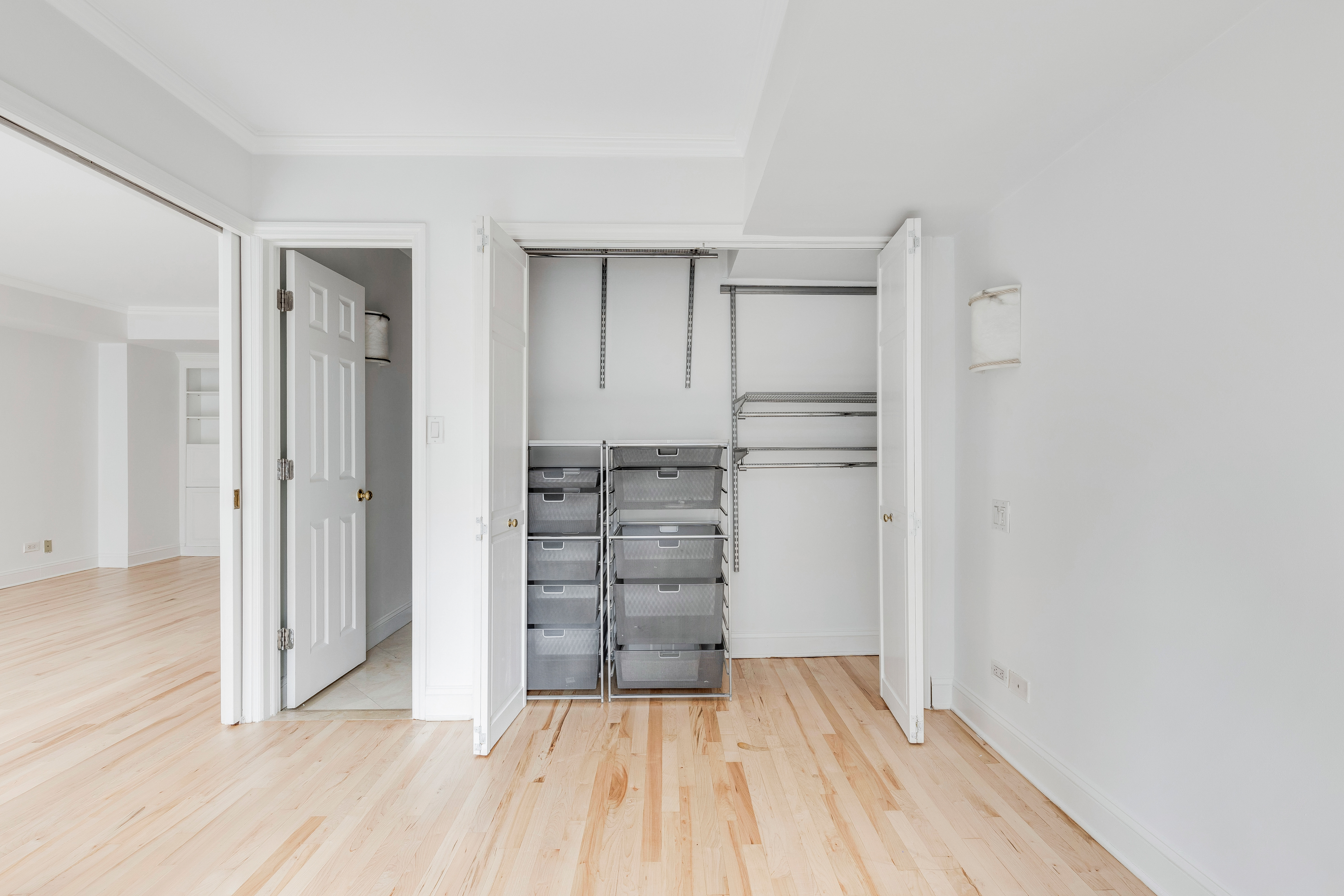 200 Central Park South, Unit 19K Manhattan, NY 10019 - Photo 8 of 14 wooden floor in an empty room