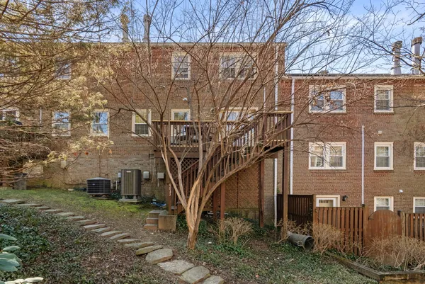 a view of a house with a small yard