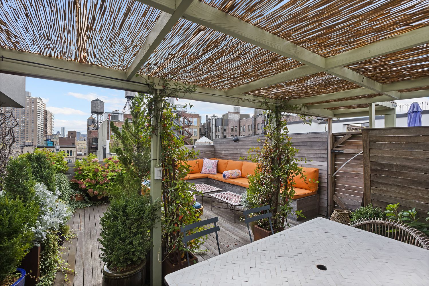 a view of a city with tall buildings