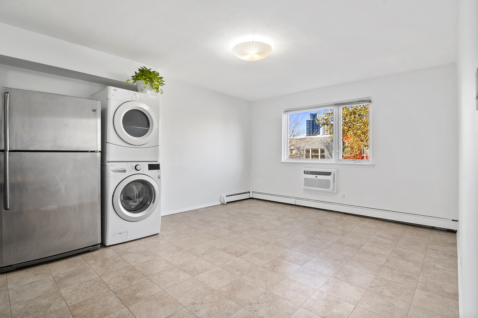 136 Java Street, Unit 3 Brooklyn, NY 11222 - Photo 4 of 11 a view of a storage & utility room with washer and dryer