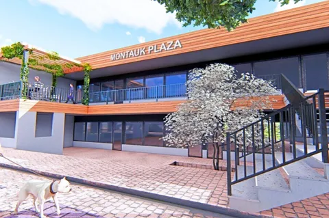 a front view of a house with large windows