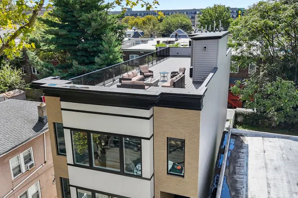 a view of a two chairs in the roof deck