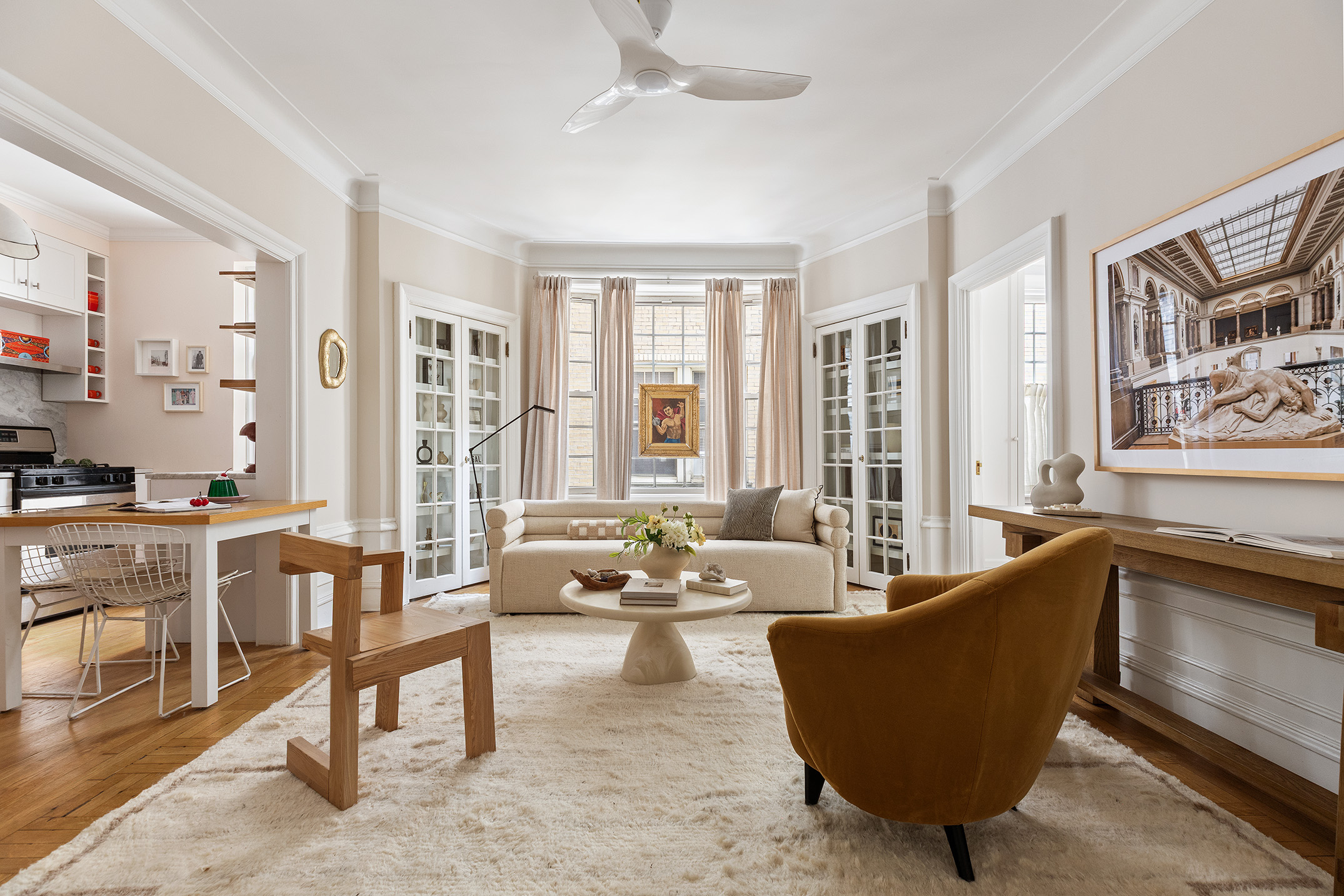 125 Prospect Park West, Unit 2E Brooklyn, NY 11215 - Photo 7 of 14 a living room with furniture and large windows