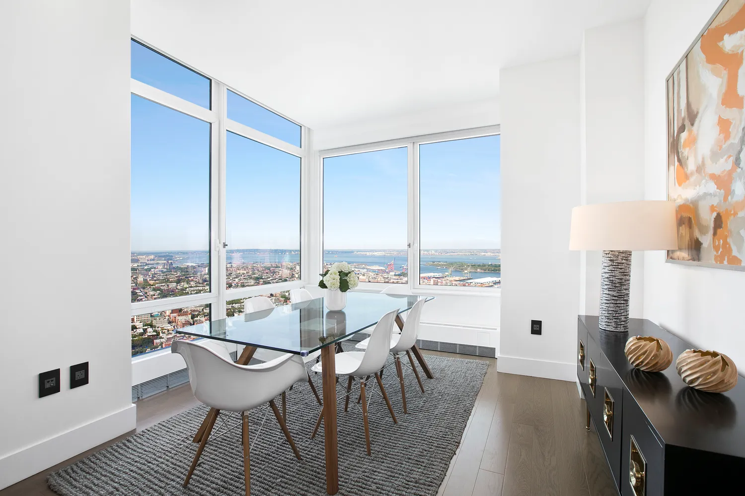 a view of a dining room with furniture window and outside view